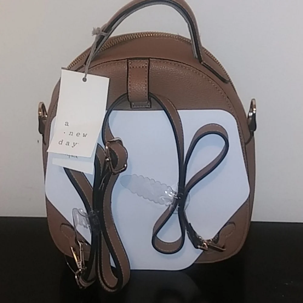 Tan Backpack With Inside & Outside Pockets